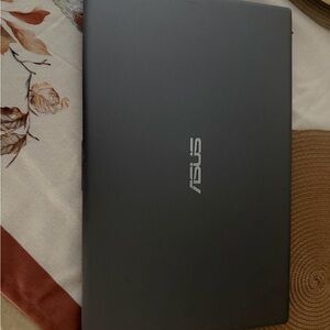 ASUS Dark Gray Laptop with Silver Logo